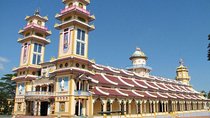 Cu Chi Tunnels and Cao Dai Temple by boat and van