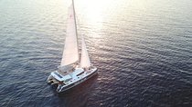 Santorini Luxury Catamaran Sunset Cruise with BBQ, Drink and Transfer