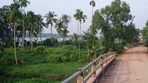 Cycling to CuChi tunnels - single track ride along Saigon river. 