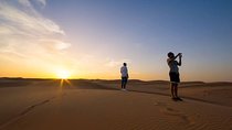 Sun Downer Desert Safari With Camel Trekking, BBQ and Buffet Dinner