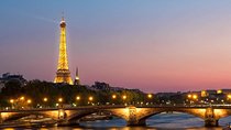 Paris By Night with Seine River Cruise and Roundtrip Luxury Transportation