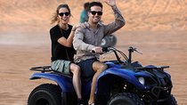 Red Dunes by Quad Bike with VIP Camp, Camels, Sandboarding & Falcon