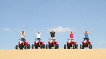 Dubai Red Dunes Safari by Quad Bike, Sand boarding, Camel Ride & BBQ Dinner