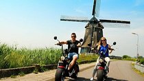 Electric Scooter Private Tour Volendam Marken Hotel pick up and drop off