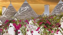 Full-day tour Alberobello & Locorotondo & Polignano a Mare & Bari