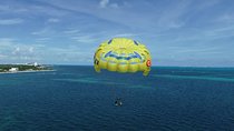 Fly Above Cancun Bay: Parasailing Experience