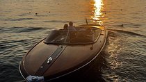 Luxury cruise on Lake Como on a Riva speedboat, with italian wine