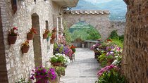 Spello: a journey through flowers, mosaics and ancient Roman ruins