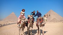 Explore Giza Pyramids & Sphinx with a camel trip