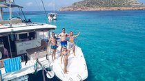 Discover Cala Bassa and Cala Comte on board a catamaran