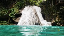"Explore Scenic Tropical Waterfalls at Blue Hole" 