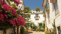 From Lisbon - Private Tour to Obidos, Nazare and Fatima with Drop-off in Porto 