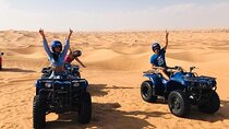 Dubai Self-drive Quad Bike,Sand Boarding,Camel Ride and Refreshments at Camp