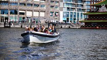 Short canal trip in German: Amsterdam in an hour