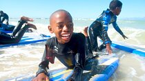 Surf Lesson w/ NGO Kids add-on
