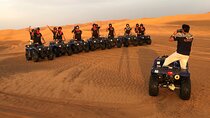 Self-drive Quad Bike with Sand Boarding and Camel Ride in Dubai