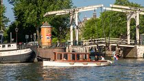 Private Boat Tour Amsterdam - 90 Min incl. welcome drink on historic saloon boat