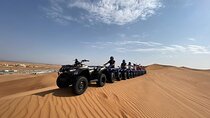 Guided Desert Quad Safari with Camelride, BBQ-Dinner and live-Shows