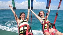 Cancun Combo Adventure: 4-Reef Stop Snorkeling and Parasail Ride