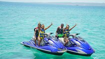 Jet Ski, Bamboo Rafting and Limestone Foot Massage Private Tour
