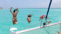 Catamaran Sailing to Isla Mujeres in Stunning Caribbean Waters