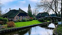 Day Tour Giethoorn, Afsluitdijk and Zaanse Schans with Boat Cruise