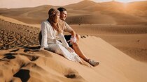Private Evening Desert Safari with BBQ Dinner, Camel Ride And Sand Boarding 