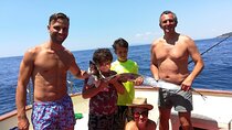 Private tour with fishing, tour of Capri and lunch on board 