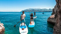 Small group paddle boarding tour to Bagni Regina Giovanna 