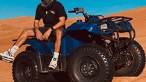 Desert Safari Dubai 25 minutes Quad Bike Free Camel Ride BBQ Dinner