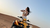Dubai Desert Safari with Quad Bike, sandboarding, live show & BBQ
