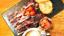 Iberian ham experience with traditional breakfast Madrid center