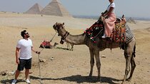 Giza pyramids and Cairo tour from Luxor hotel by plane
