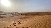 Morning Desert Safari with Dune Bashing, Camel Ride, Sand Board & Quad Biking