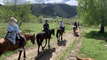 Horseback riding on the mountains of Chon Kemin National Park