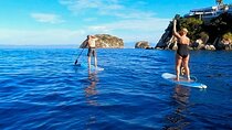 Paddleboard adventure to the arches of Mismaloya