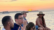 Sunset boat ride in the bay with free drinks