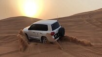 Dubai Desert Safari With Camel Ride and Sand Boarding