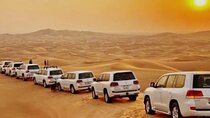 Dubai Desert Safari with Camel Ride, Sand surf, & BBQ Dinner