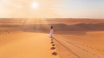 Desert Safari Abu Dhabi w/ Sand Boarding, Camel Ride & BBQ Dinner