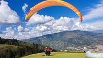 Go Paragliding in Medellín with private transporter service