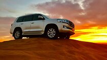 Dubai Dune Bashing with Camel Ride, Sandboarding & BBQ Dinner