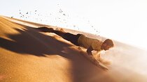 Arabian Red Dune Desert Safari with Sand Boarding & Camel Ride