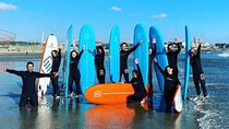 Small Group Surfing Experience with Transportation in Porto