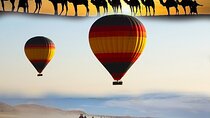 Pick an outdoor Activity: Balloons, QUAD, Camel Ride, Sahara Trip