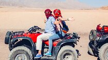 Ride into the Sunset Quad Biking Desert Safari Experience