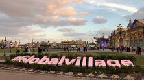 Global Village Tour with Private Return Transfers