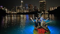 Giant Glow Paddleboarding the Downtown Skyline with Bats