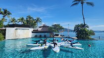 Zen & Splash: Stand-Up Paddleboard (SUP) Yoga in Tanjung Aru
