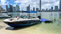 Experience a fun private boat tour cruising Miami Skyline + more